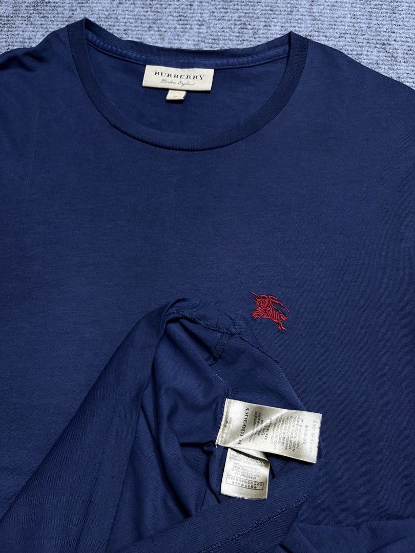 Burberry Shirt💥 (Category: Tshirts & Polo Shirts ) located in Cebu City. Submitted by youngyeum247 (Listing ID 1465337095, Image 2). Description: Burberry Shirt💥 • Fits: M-L • Width: 20 • Length: 28 • Color rate: 9.5/10 • Condition: 9/10 • Issue: NONE •Color may vary due to lighting🙏🏻 DM TO PURCHASE📥.
