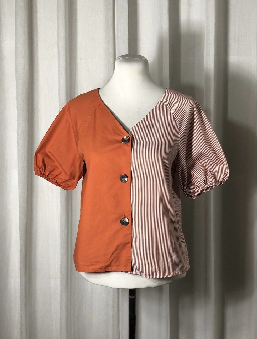 Button up Blouse with Rust Orange Stripes (Category: Blouses) located in Ozamiz City. Submitted by raeuma (Listing ID 1465340135, Image 1). Description: 👚 Solid orange x stripes orange and white buttoned top - Bust: 38in - Length: 22in - Condition: Excellent. Made from high-quality, thick fabric that feels durable and substantial. It has been well cared for, with no noticeable flaws. ‼️Note: Bought at an Instagram store but it does not fit me. �