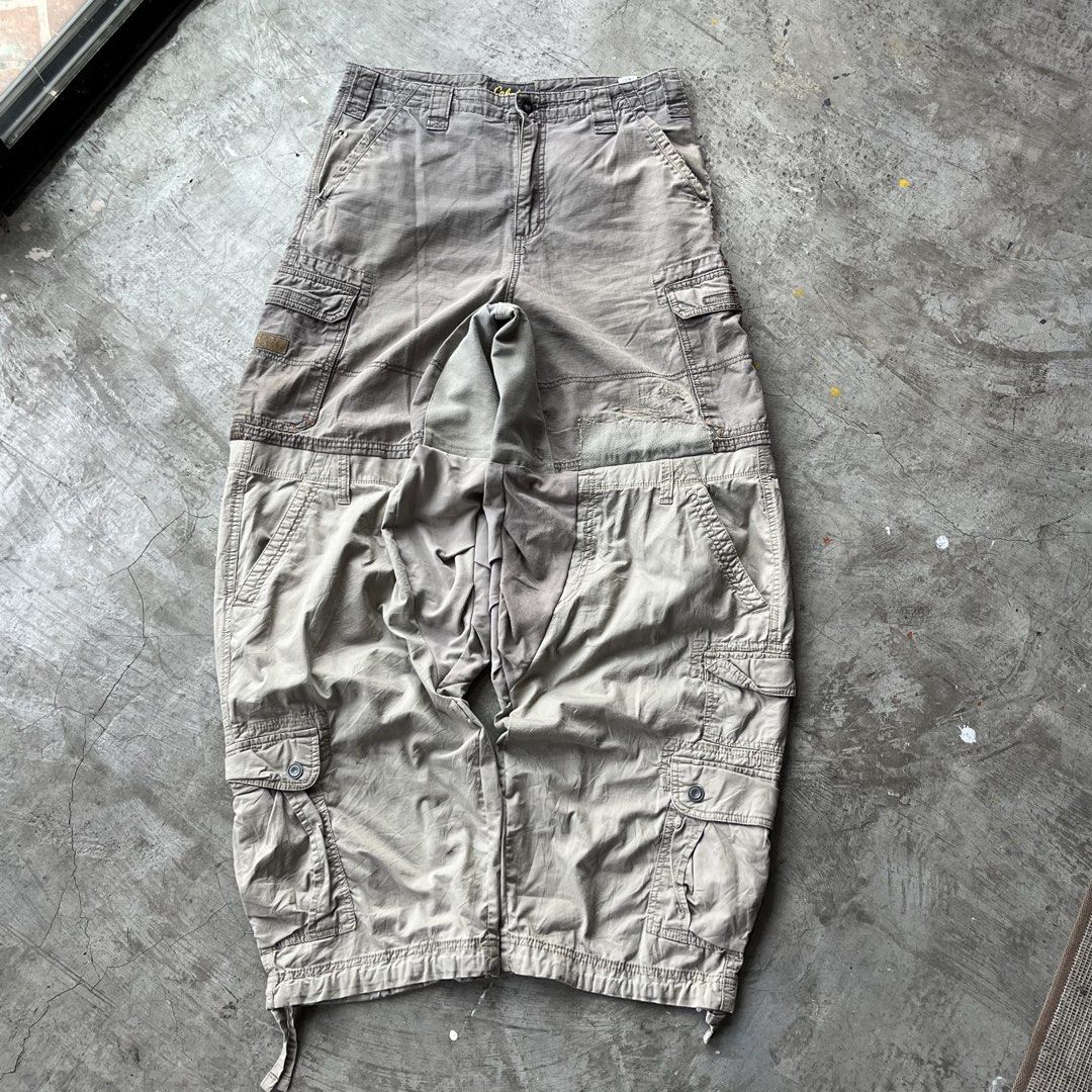Cabela's Upcycled Multi-Panel Cargo Pants (Category: Jeans) located in Bulacan. Submitted by afterlife___atelier (Listing ID 1465253218, Image 1). Description: Size:XL Good for height:5’6-5’8 Model height: 5’6 Condition:4/5 -Dimensions Waist:33 Length:42” Leg Opening:11” Crotch:12” 🚚Courier:J&T / Lalamove 💸Payment:Paymaya/Gcash 📍Location:Fairview QC Please see description and double check pictures that are provided. Don’t hesitate to ask for o