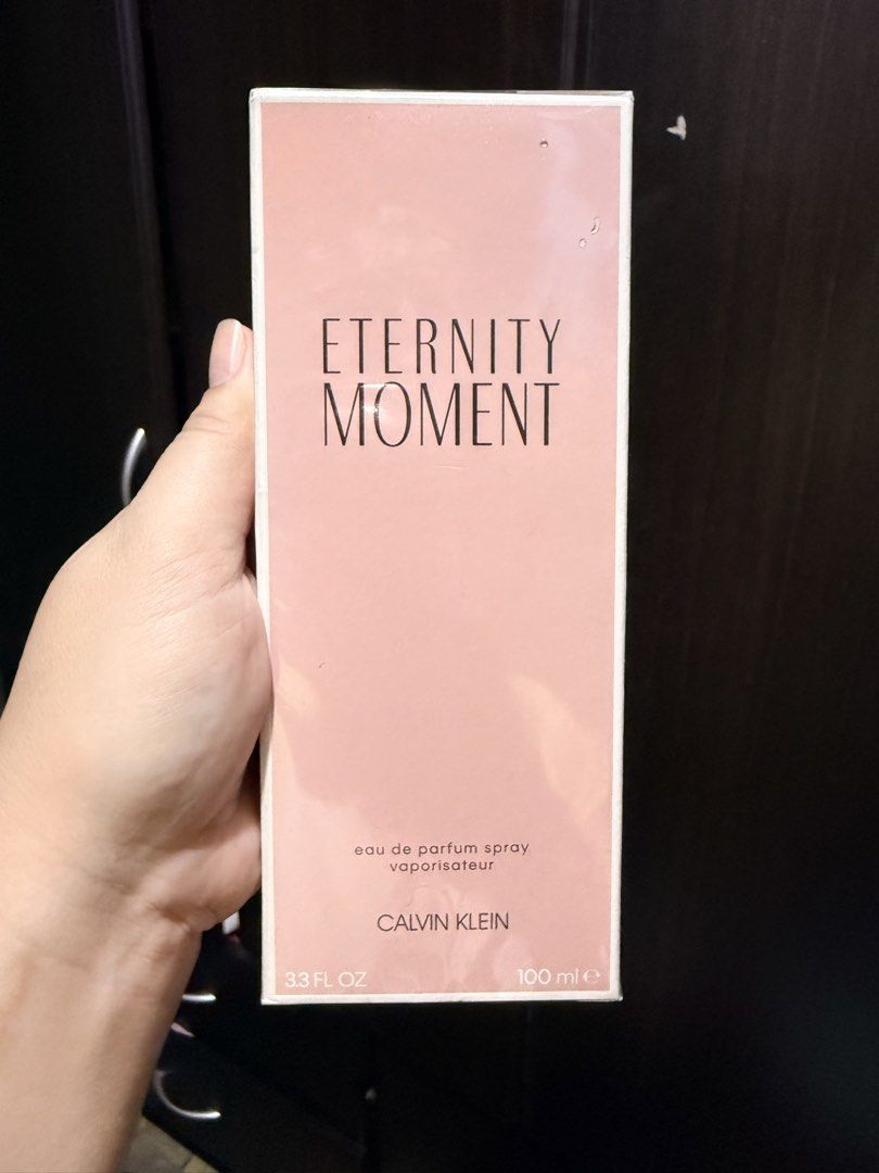 Calvin Klein Eternity Moment Eau De Parfum 100ml (Category: Fragrance & Deodorants) located in Quezon City. Submitted by gel.cortez (Listing ID 1465216110, Image 1). Description: - Brand: Calvin Klein Eternity Moment - Type: Eau de Parfum (EDP) Spray - Size: 100 ml / 3.3 fl. oz. (Large size) - Condition: Brand new, still sealed in original plastic wrap with pink packaging box - Fragrance: Fresh and great floral scent - Fulfillment: Ready to ship 