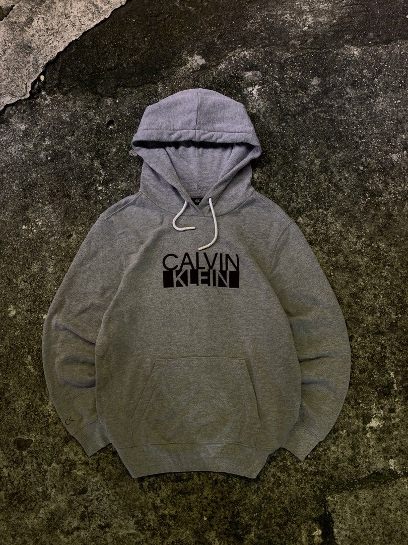 Calvin Klein Grey Performance Hoodie (Category: Hoodies) located in Manila. Submitted by loyspalencia (Listing ID 1465263221, Image 1). Description: - Grey Calvin Klein hoodie - Features Calvin Klein Performance logo on front - Front pocket and adjustable drawstring hood - Size M/M - Made in Indonesia - Ideal for casual wear - Dimes: W- 20 / L-26 / Sleeves- 20 - Size: Meduim - Execellent Condition.