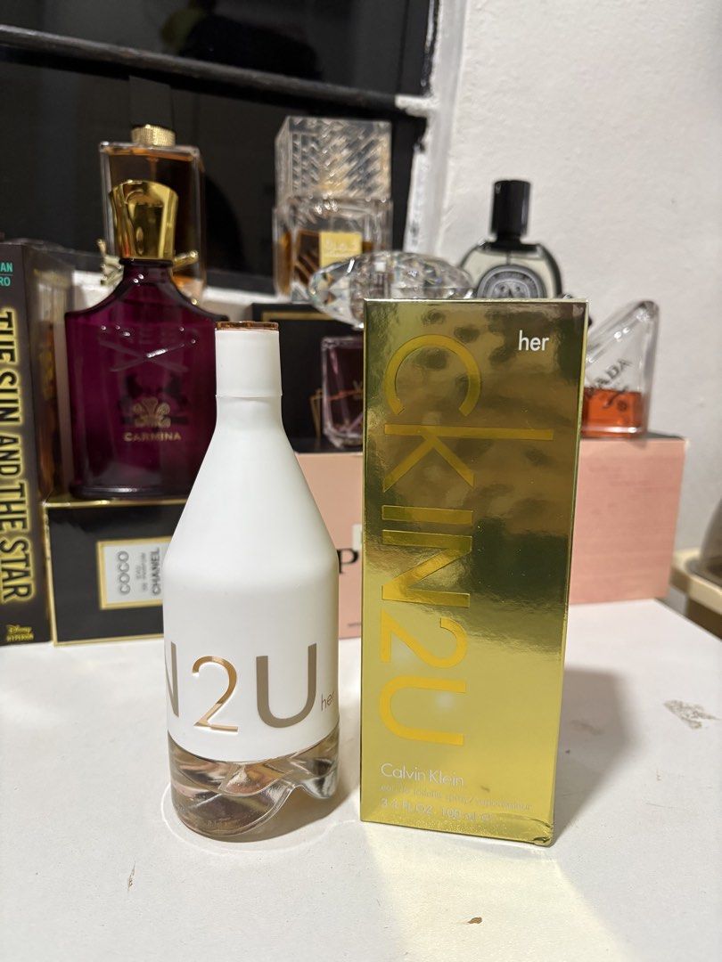 Calvin Klein IN2U Her EDT 100ml (Category: Fragrance & Deodorants) located in Caloocan City. Submitted by esnairahhh (Listing ID 1465379736, Image 1). Description: - Tester Calvin Klein IN2U Her Eau de Toilette - Size: 100ml (practically full, only sprayed a couple of times) - Fresh citrus and floral scent profile, ideal for daily wear - Comes with the matching original gold box - Stored properly in a cool, dark place away from sunlight - RFS: De