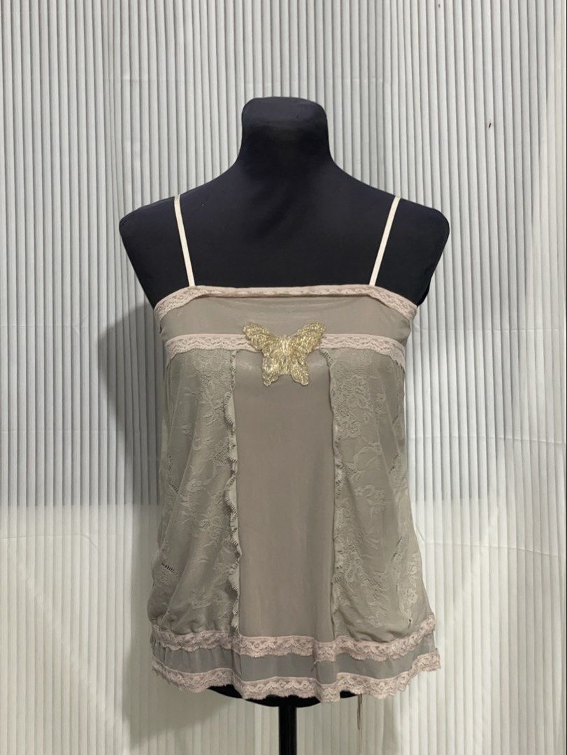 Cami Top with glittered butterfly Design (Category: Sleeveless) located in Tuguegarao City. Submitted by ziggerryy (Listing ID 1465370059, Image 3). Description: No flaws. No holes S-M .