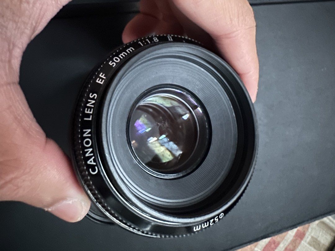 CANON 50MM LENS (Category: Lens & Kits) located in Mangaldan. Submitted by kapty (Listing ID 1465172137, Image 3). Description: CANON 50MM LENS MINIMAL FUNGUS AUTOFOCUS WORKING WITH 2 UV FILTER ALL WORKING NEGOTIABLE.