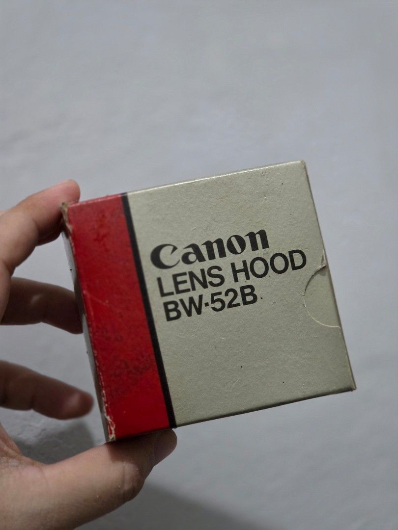 Canon Lens Hood BW-52B (Category: Lens & Kits) located in Manila. Submitted by manilafilmshop (Listing ID 1465183582, Image 3). Description: - Authentic Canon BW-52B lens hood, made in Japan - Comes with original box - Blocks stray light to improve contrast and image quality - Protects your valuable camera lens from accidental impacts - Clean and ready to mount on vintage Canon setups.