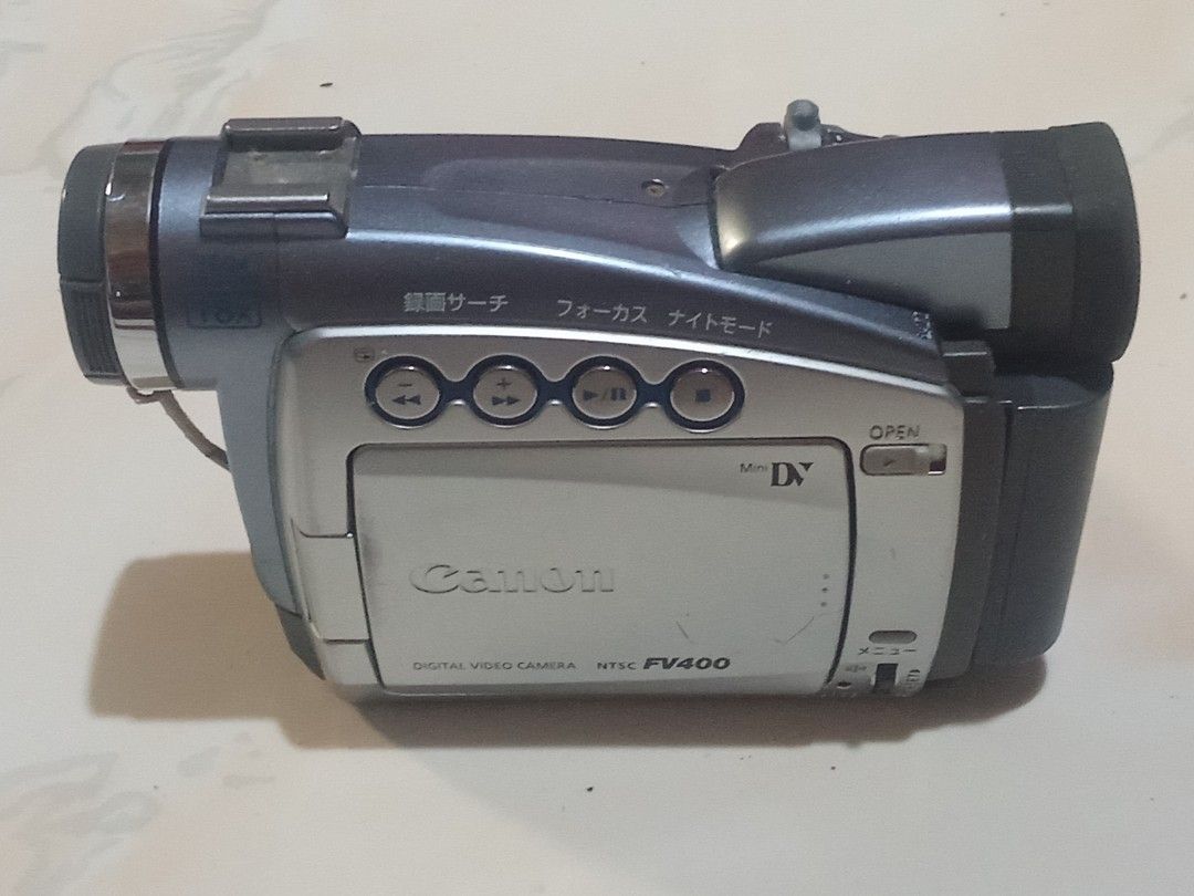 Canon Mini-Dv Palm size Handycam (Category: Video Cameras) located in Manila. Submitted by mamatet.mamatetvasquez (Listing ID 1465184958, Image 3). Description: PTP ADMIN 🙋 Canon Mini-Dv Palm size Handycam Video Recording & Playback Working Japanese Language w/English Version No SD Card Slot No Night Vision No built-in Memory Unit , Battery & Charger What you see is What you get PRICE 👉 Php 3k Only No to LOW BALLER No Reservation , 1st come 1st
