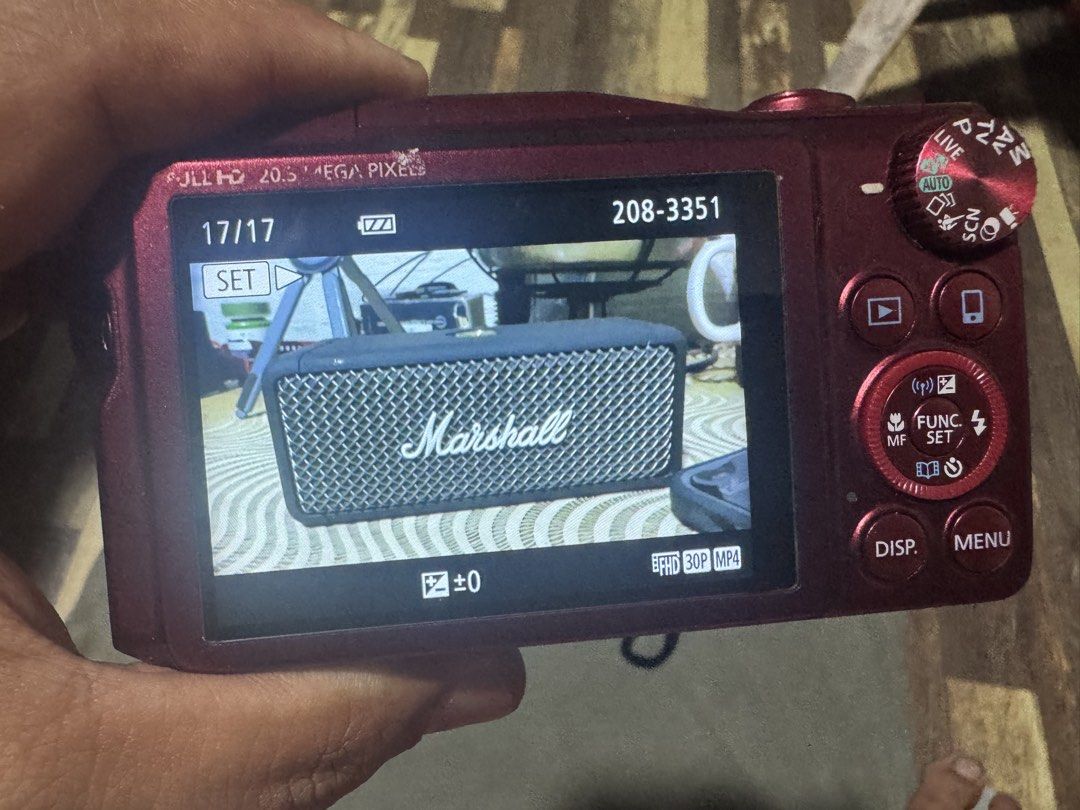 Canon PowerShot SX710 HS Red Digital Camera Bundle (Category: Cameras) located in Quezon City. Submitted by angace13 (Listing ID 1465324994, Image 3). Description: Canon PowerShot SX710 HS in striking red. 20.5 megapixels with a massive 30x optical zoom lens. Includes the original battery pack, wall battery charger, wrist strap, and a fitted black Case Logic pouch. Fully tested and working great, screen powers on clearly. Minor scuffs near the ed