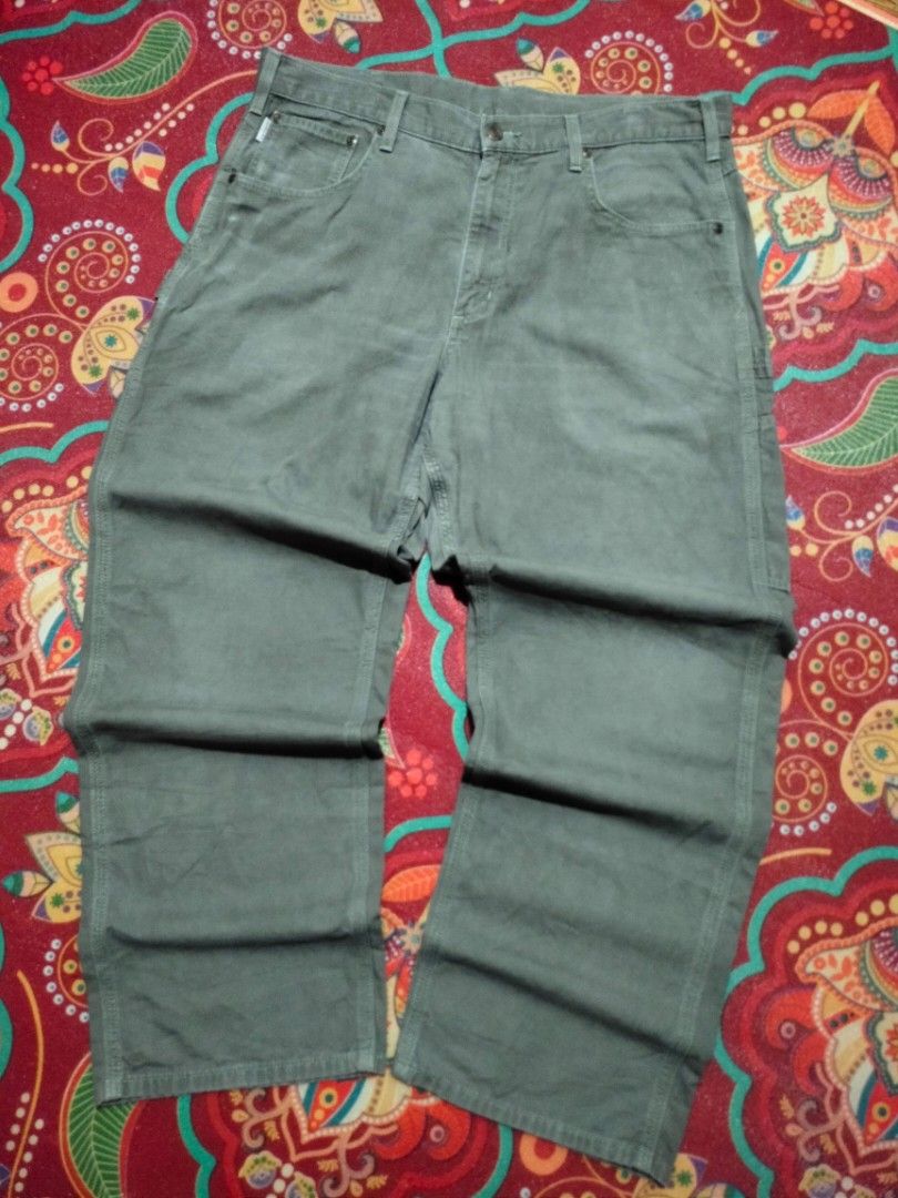 CARHARTT B159 DMS CARPENTER PANTS (SIZE 38) (Category: Jeans) located in San Joaquin. Submitted by myksss19 (Listing ID 1465322740, Image 1). Description: CARHARTT B159 DMS CARPENTER PANTS SIZE 38 IN VERY GOOD TO EXCELLENT CONDITION. ONLY FLAWS MINOR CRACK ON PATCH AND SIGN OF USAGE.