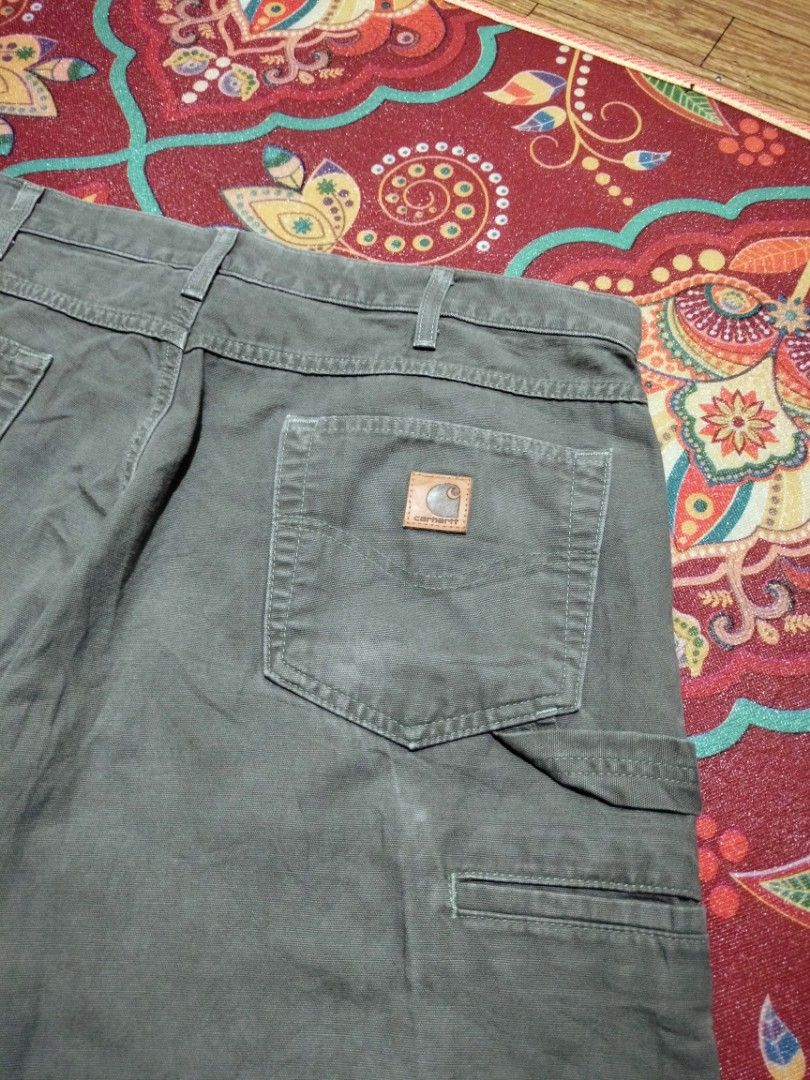 CARHARTT B159 DMS CARPENTER PANTS (SIZE 38) (Category: Jeans) located in San Joaquin. Submitted by myksss19 (Listing ID 1465322740, Image 3). Description: CARHARTT B159 DMS CARPENTER PANTS SIZE 38 IN VERY GOOD TO EXCELLENT CONDITION. ONLY FLAWS MINOR CRACK ON PATCH AND SIGN OF USAGE.