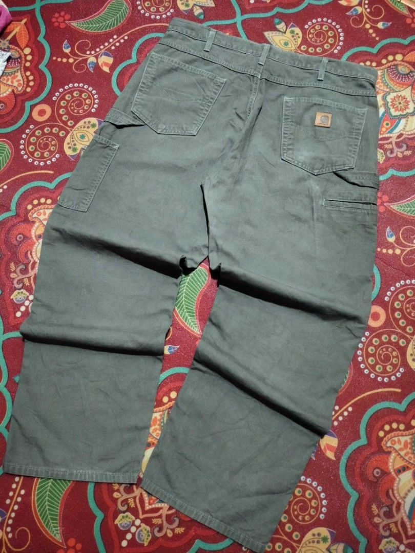 CARHARTT B159 DMS CARPENTER PANTS (SIZE 38) (Category: Jeans) located in San Joaquin. Submitted by myksss19 (Listing ID 1465322740, Image 2). Description: CARHARTT B159 DMS CARPENTER PANTS SIZE 38 IN VERY GOOD TO EXCELLENT CONDITION. ONLY FLAWS MINOR CRACK ON PATCH AND SIGN OF USAGE.