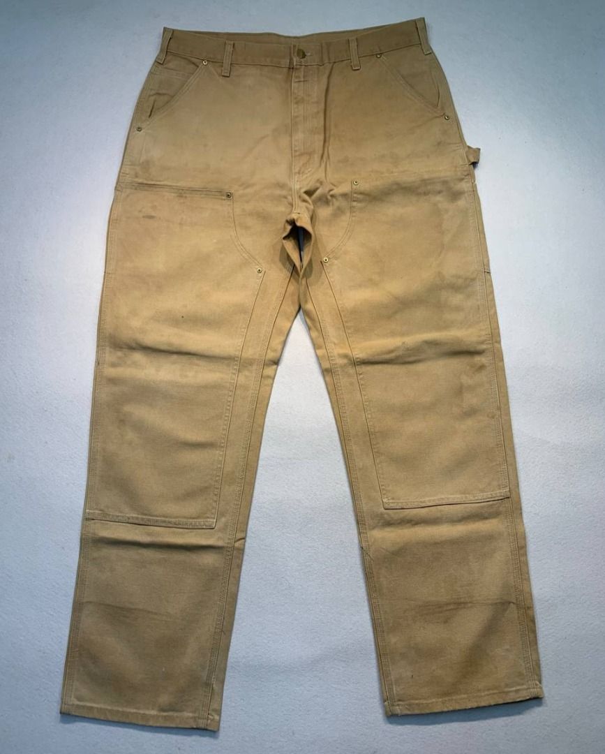 Carhartt Double Knee Worker Pants (Category: Jeans) located in Mandaluyong City. Submitted by theroom501 (Listing ID 1465359994, Image 2). Description: Carhartt Double Knee Worker Pants Style Code: BO1 BRN Size on Tag: 38 Color: Brown Condition: Good pre-owned condition with a heavily distressed vintage look. Flaws/Issues: Heavy distressing throughout the fabric paint stain. Flat Lay Measurements: Pit to Pit: 38 inches Length: 46 inches Leegopeni