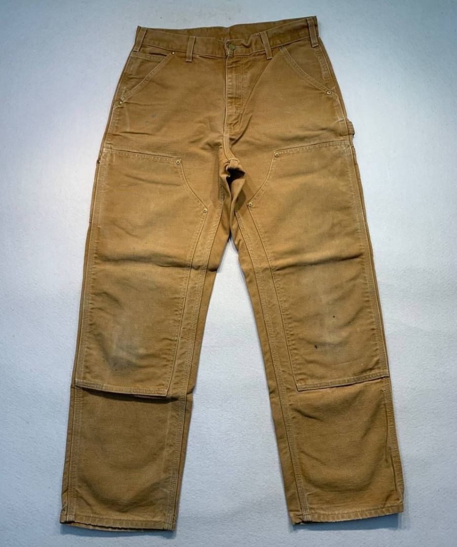 Carhartt Double Knee Worker Pants (Category: Jeans) located in Mandaluyong City. Submitted by theroom501 (Listing ID 1465361499, Image 2). Description: Carhartt Double Knee Worker Pants Style Code: BO1 BRN Size on Tag: 32 Color: Brown Condition: Good pre-owned condition with a heavily distressed vintage look. Flaws/Issues: Heavy distressing throughout the fabric paint stain. Flat Lay Measurements: Pit to Pit: 32 inches Length: 40.5 inches Leegope