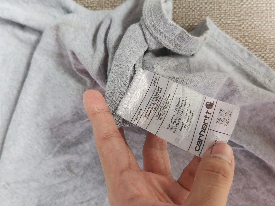 Carhartt pocket box type (Category: Tshirts & Polo Shirts ) located in Las Pinas. Submitted by jrwnrzn (Listing ID 1465302787, Image 3). Description: - Brand: Carhartt - Style: Original Fit Short Sleeve Pocket T-Shirt - Size: XXL box type 28L x 25w ganda sizing crop style - need wash - Color: Heather Grey - Material: Cotton and polyester blend (Made in Guatemala) - Details: Crew neck, small chest pocket with stitched Carhartt logo label, tags int