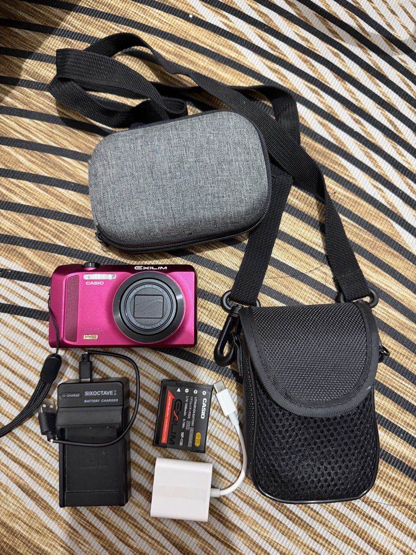Casio Exilim EX-ZR200 Digital Camera (Category: Cameras) located in Manila. Submitted by _thepursela (Listing ID 1465331597, Image 1). Description: RFS: Rarely used Inclusion: 2 camera pouch/bag 2 Batteries 1 Universal Charger 1 SD card 1 Card reader.