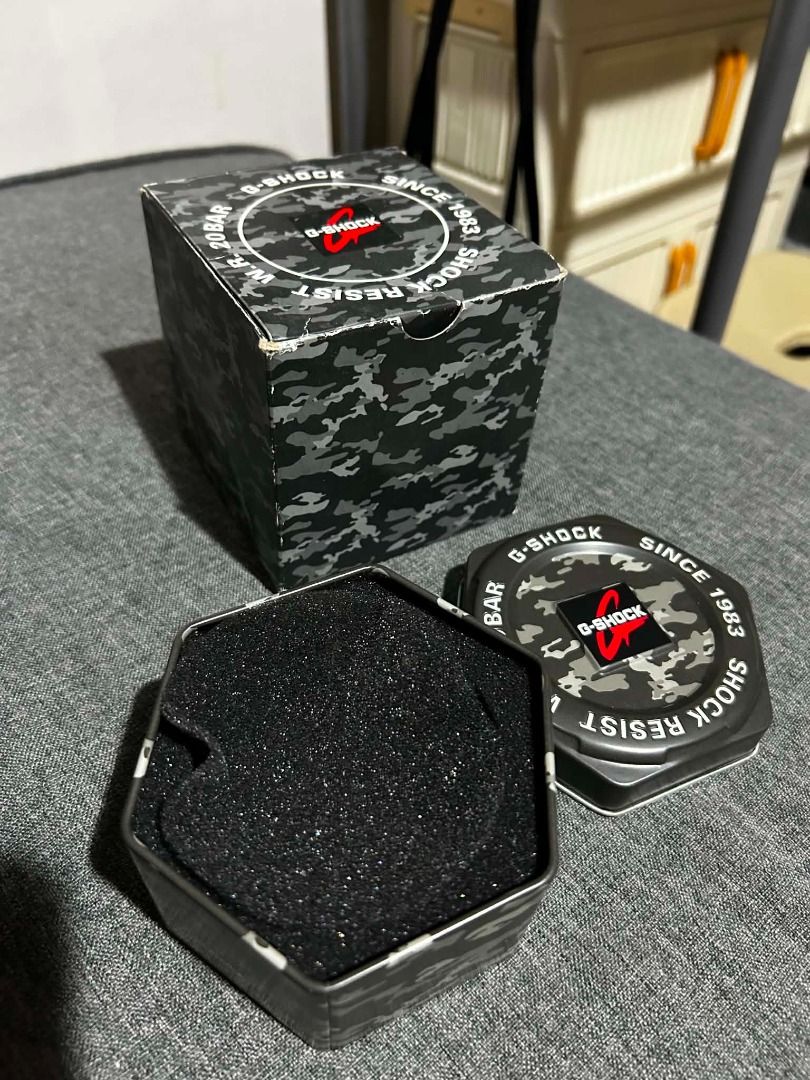 Casio G-Shock Watch Boxes Tin Containers (Category: Accessory Holder, Box & Organizers) located in Bulacan. Submitted by jseongcart_ (Listing ID 1465226924, Image 3). Description: - Authentic Casio G-Shock hexagonal metal tins with matching outer boxes - Available in sleek black and cool camouflage patterns - Includes protective foam inserts inside for safe storage - Ideal for organizing watches, accessories, or small items - SOLD AS SET ONLY - N