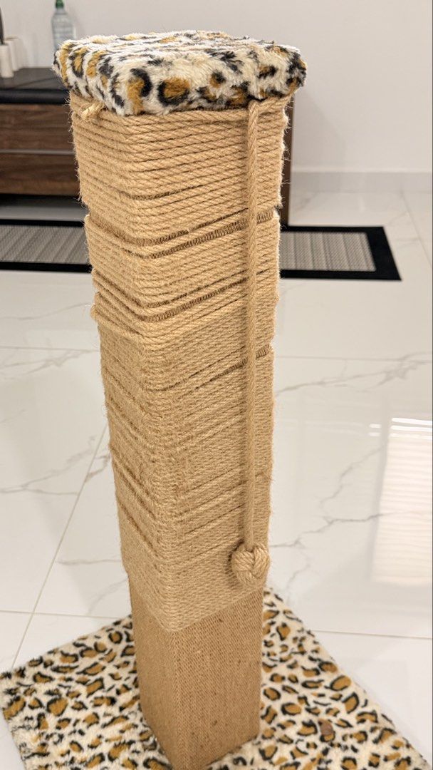 Cat Scratch post (Category: Homes & Other Pet Accessories) located in Singapore. Submitted by halal_deals (Listing ID 1465214733, Image 3). Description: Large scratch post for cats. I have added rope around the original post (My late cat prefers scratching on ropes). So the original surface underneath the rope is actually brand new. Large sturdy base. Clearing other cat items, check out my listings. Self collection For drivers: Self Collection at