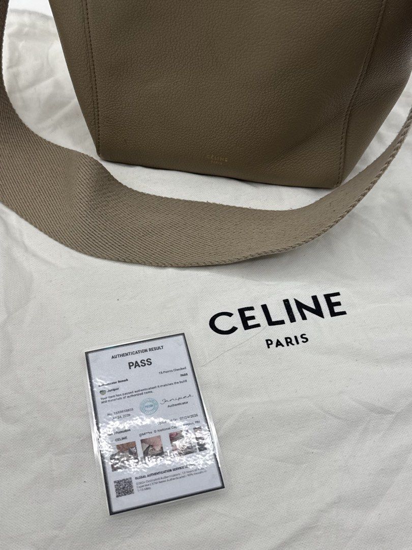 Celine Bucket Bag (Category: Cross-body Bags) located in Caloocan City. Submitted by rossvault2 (Listing ID 1465230657, Image 2). Description: - Brand: Celine - Material: Taupe grained leather with suede interior - Hardware: Gold-tone - Strap: Wide canvas shoulder strap - Inclusions: Dust bag and authentication card - Condition: Minimal signs of handling, very clean interior.