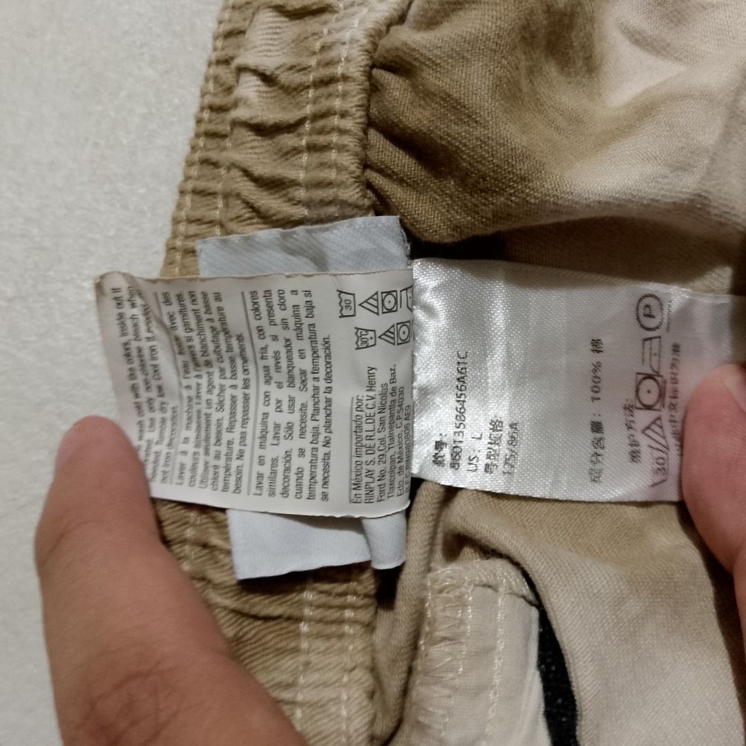 Champion Tie-Dye Brown Shorts Size L (Category: Shorts) located in Caloocan City. Submitted by raf_thrifts (Listing ID 1465289872, Image 2). Description: - Brand: Champion - Style: Shorts in a brown tie-dye pattern - Size: L - Material: 100% soft and breathable cotton - Waistband: Elastic with an adjustable drawstring - Details: Small embroidered logo on front leg hem and patch logo on back pocket - Origin: Made in Vietnam.