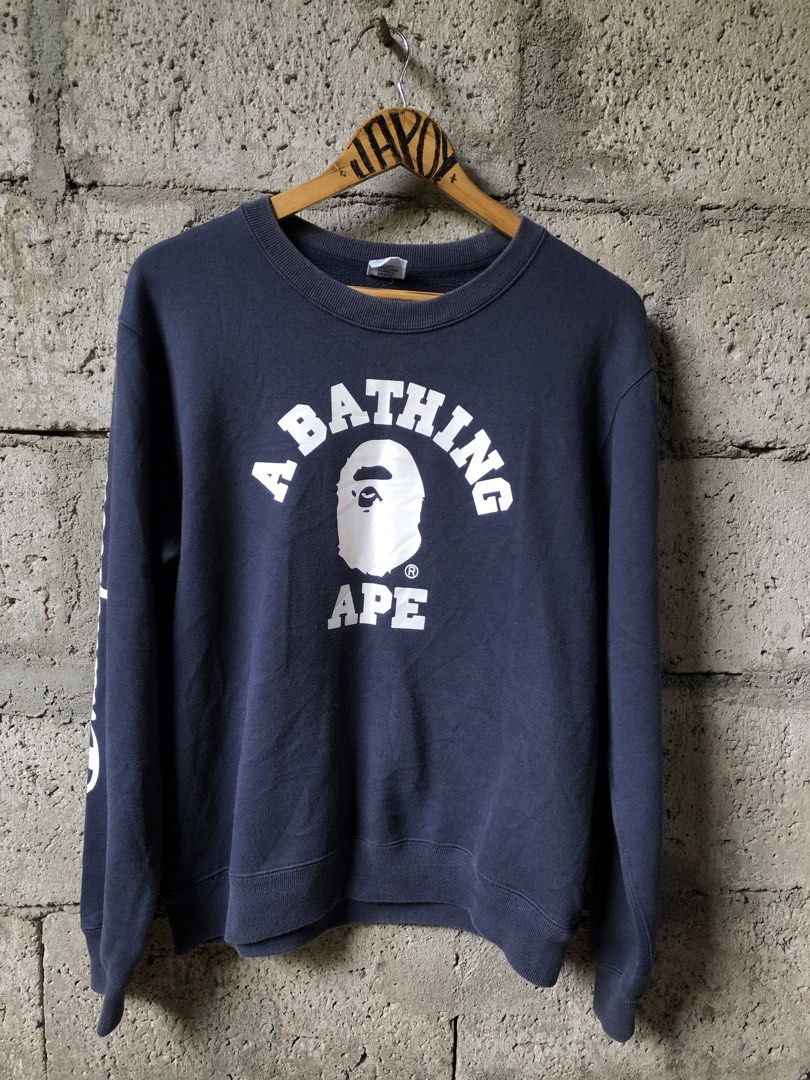 Champion X Bathing ape collaboration (Category: Coats, Jackets and Outerwear) located in Caloocan City. Submitted by papi_chulo199x (Listing ID 1465212244, Image 1). Description: Champion X bathing ape medium on tag 26x21 condition 9 color rate 9 No issue.