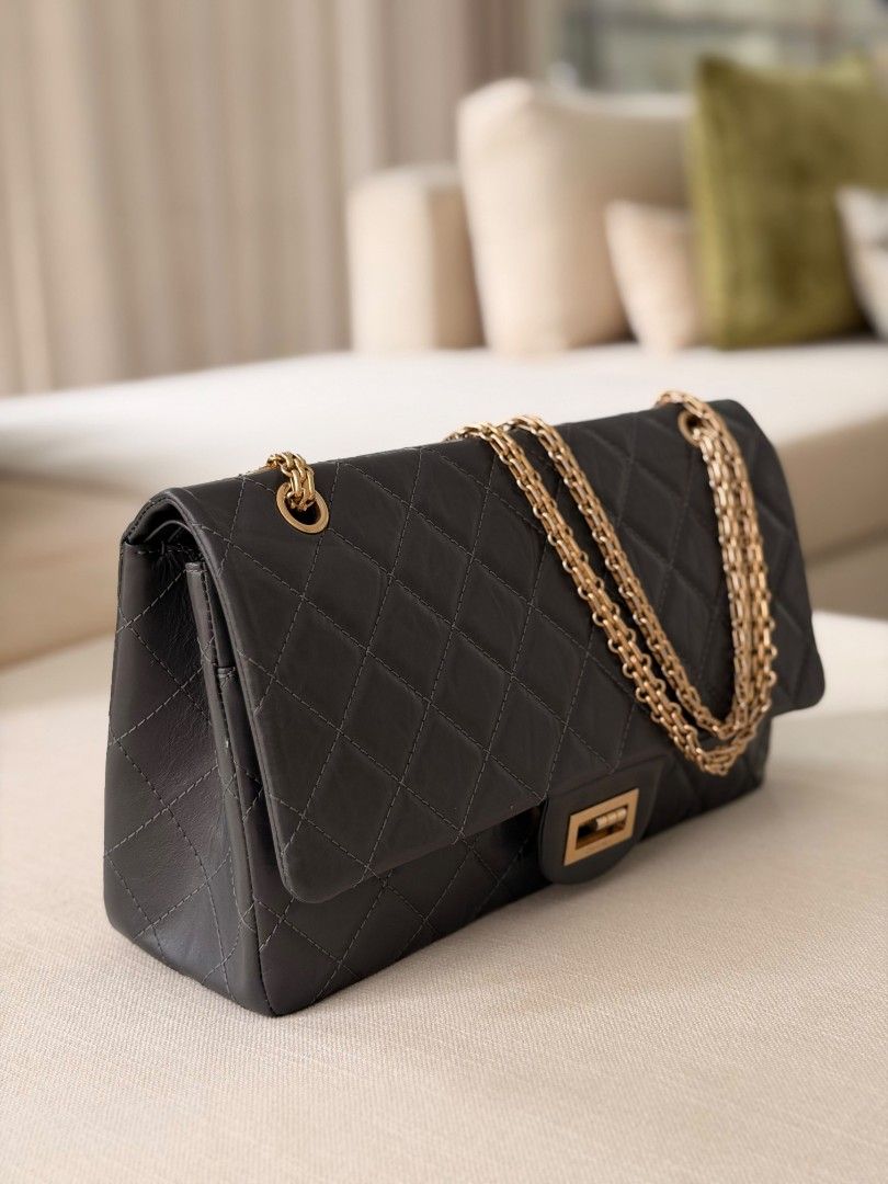 Chanel 2.55 Reissue in Navy Blue (Category: Luxury Bags & Wallets) located in Pasig City. Submitted by ejereyes (Listing ID 1465312160, Image 2). Description: Chanel 2.55 Reissue Navy Blue, Gold Hardware Series 13 Mint Condition Personal collection Bought in Rome, Italy Complete with box, dust bag, authenticity card Message for any questions or inquiries :) Location is in Ugong, Pasig.