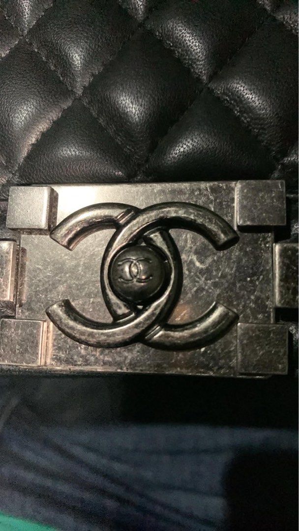 Chanel Boy Flap Bag Black Quilted Leather (Category: Luxury Bags & Wallets) located in Manila. Submitted by notjaneahe05680 (Listing ID 1465173096, Image 2). Description: - Brand: Chanel - Model: Boy Flap Bag - Material: Black quilted leather with smooth leather interior and side gussets - Hardware: Ruthenium with chunky chain strap and push-lock CC clasp - Design: Structured rectangular shape - Condition: Scuff marks on metal hardware from regul