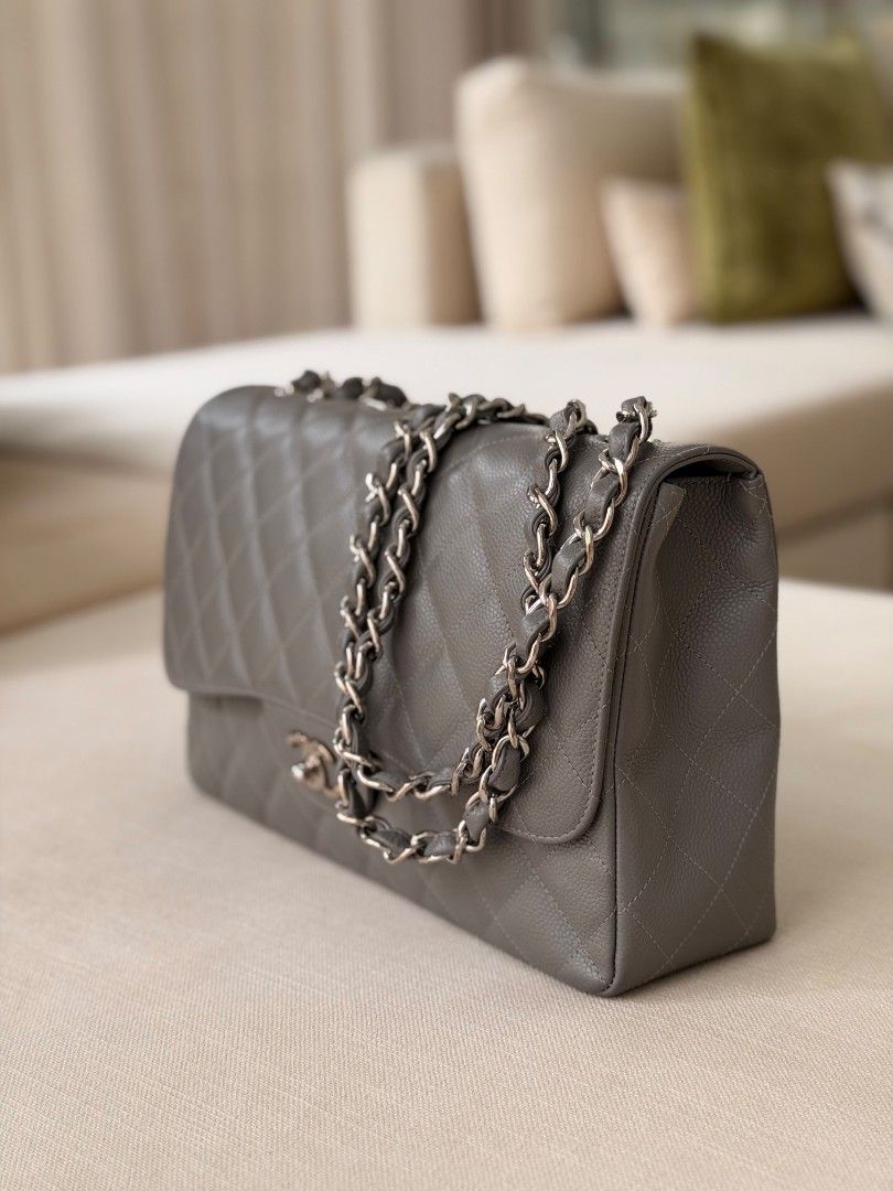 Chanel Classic Jumbo Flap in Grey Caviar (Category: Luxury Bags & Wallets) located in Pasig City. Submitted by ejereyes (Listing ID 1465310648, Image 2). Description: Chanel Classic Jumbo Flap Grey Caviar, Silver Hardware Series 18 Mint Condition Personal collection Bought in Singapore Complete with box, dust bag, authenticity card Message for any questions or inquiries :) Location is in Ugong, Pasig.