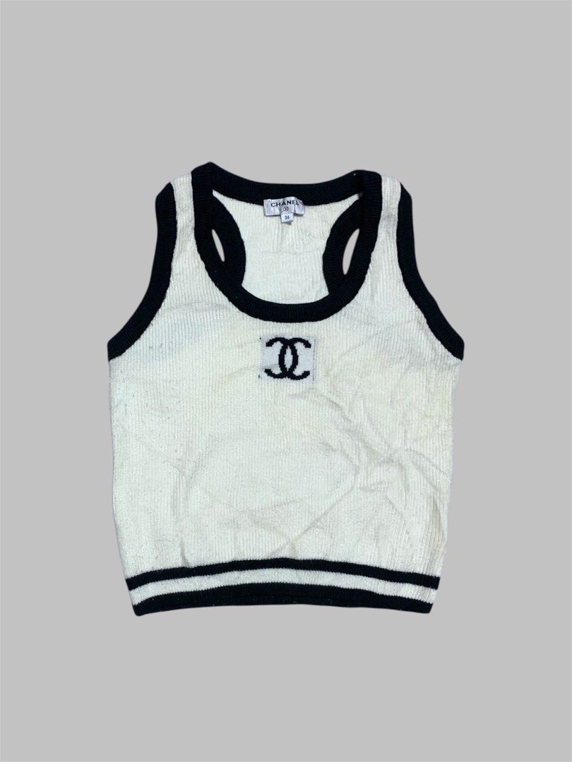 CHANEL KNIT TANK TOP (Category: Luxury Apparel) located in General Trias. Submitted by kyledeterala6969 (Listing ID 1465274872, Image 2). Description: Chanel Knit Top No issue Like new Color rate - 10/10 Length - 17 Pit to pit - 14.5 Stretchable Location: General Trias City, Cavitte.