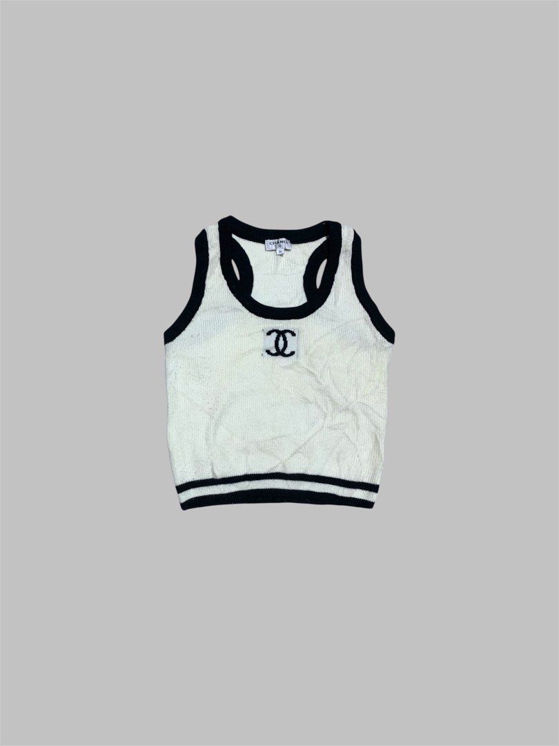CHANEL KNIT TANK TOP (Category: Luxury Apparel) located in General Trias. Submitted by kyledeterala6969 (Listing ID 1465274872, Image 1). Description: Chanel Knit Top No issue Like new Color rate - 10/10 Length - 17 Pit to pit - 14.5 Stretchable Location: General Trias City, Cavitte.