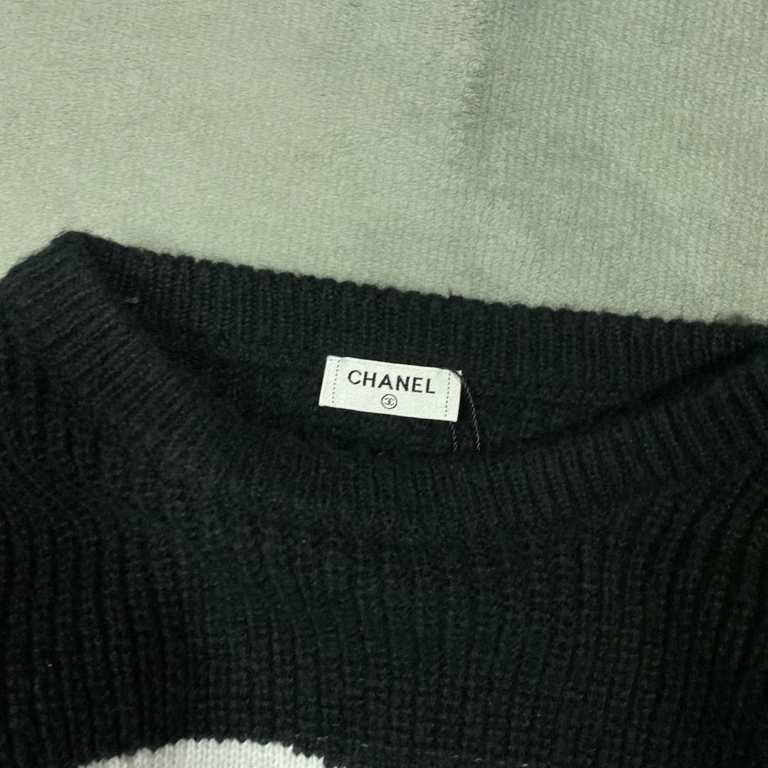 Chanel Knitted Crewneck (Category: Hoodies) located in Imus. Submitted by lsthriftsaig (Listing ID 1465253333, Image 3). Description: Chanel Knitted Crewneck 1 Size tag: None (Fits L) Length: 28 Width: 23 Issue(s): None Condition: 10/10.