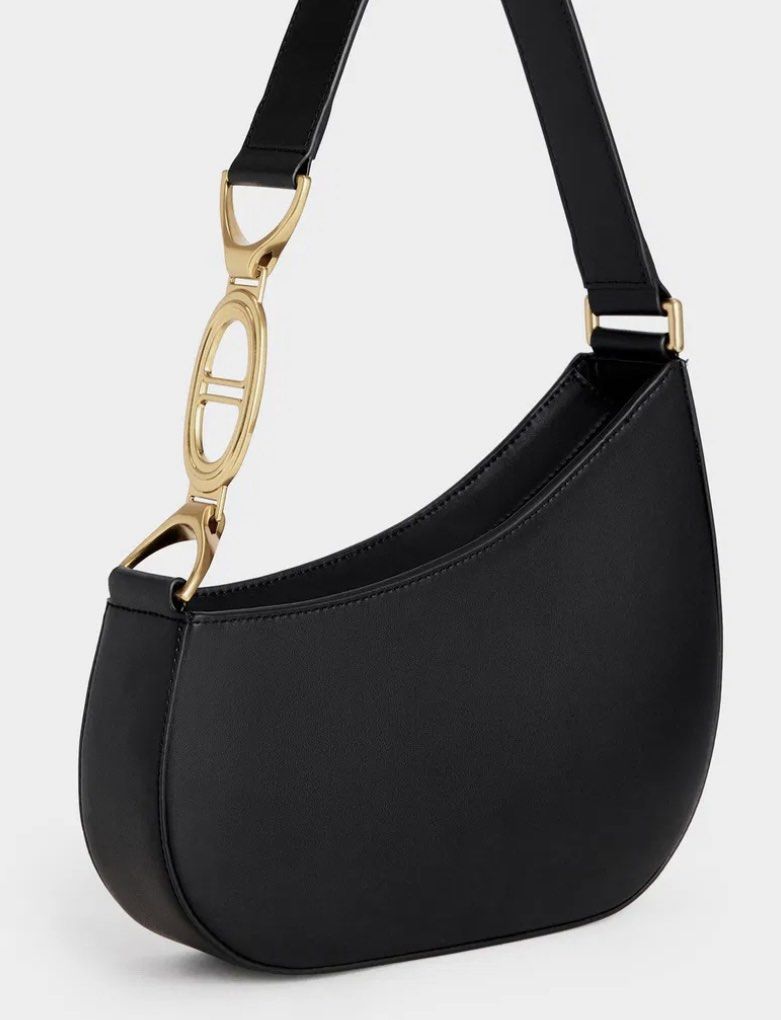 Charles & Keith Asymmetrical Shoulder Bag (Category: Announcements) located in Rizal. Submitted by bhe.mm (Listing ID 1465381608, Image 3). Description: CHARLES & Keith Bag Asymmetrical Black color Medium Lightly Used bought this from Charles&Keith website. Guaranteed Original! Your perfect on-the-go bag, spacious pa. Can fit 2-3 phones and with other stuffs. Payment: Gcash shipping: lalamove or JNT (delivery fee shoulder by buyer) .