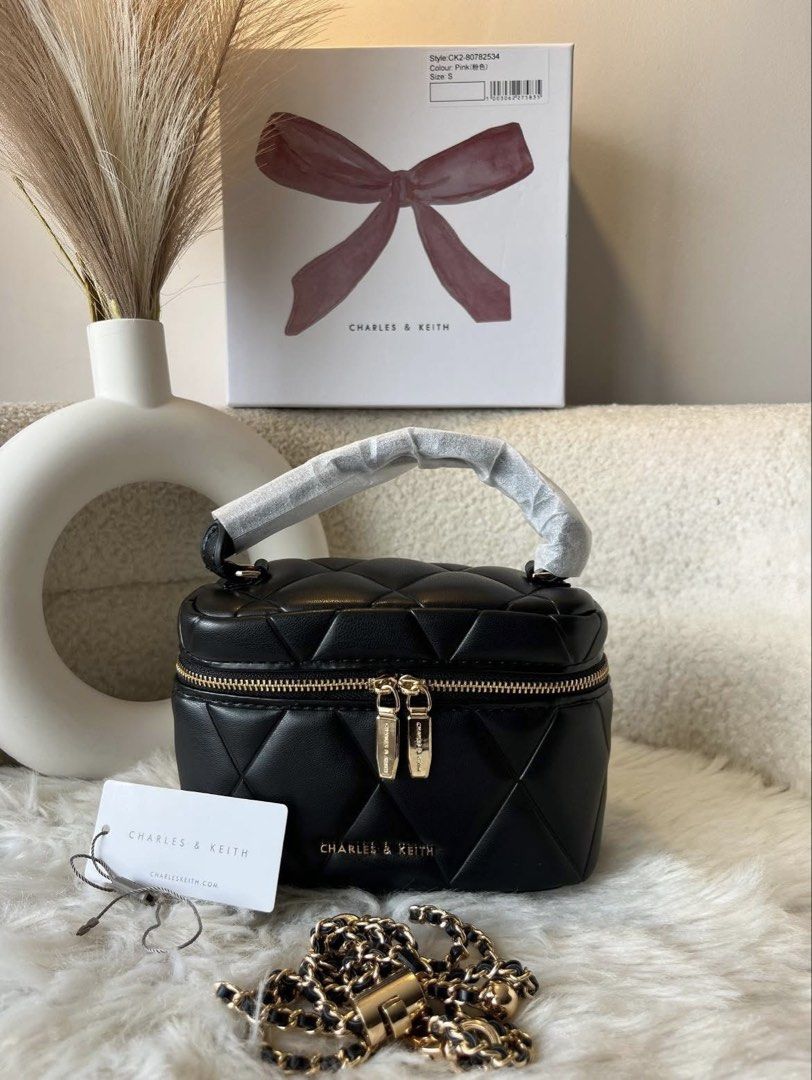 Charles & Keith Arwen Quilted Vanity Bag - Black (Category: Cross-body Bags) located in Pasig City. Submitted by preloved.closet2 (Listing ID 1465378114, Image 1). Description: With Box With Sling Size 8 inches Color black Add paperbag plus 80 .