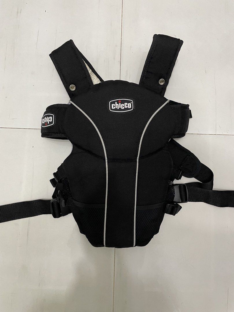Chicco Black Baby Carrier (Category: Carriers & Slings) located in San Jose del Monte. Submitted by momma_buys (Listing ID 1465376573, Image 2). Description: - Brand: Chicco - Color: Black - Breathable front mesh sections to keep baby cool - Padded shoulder straps that cross at the back for comfort and weight distribution - Secure buckle system with multiple adjustment points for growing babies and different wearers - Clean and fully functional w