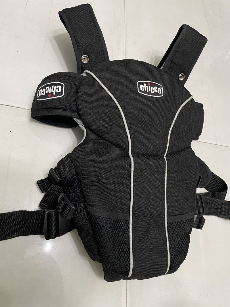 Chicco Black Baby Carrier (Category: Carriers & Slings) located in San Jose del Monte. Submitted by momma_buys (Listing ID 1465376573, Image 3). Description: - Brand: Chicco - Color: Black - Breathable front mesh sections to keep baby cool - Padded shoulder straps that cross at the back for comfort and weight distribution - Secure buckle system with multiple adjustment points for growing babies and different wearers - Clean and fully functional w