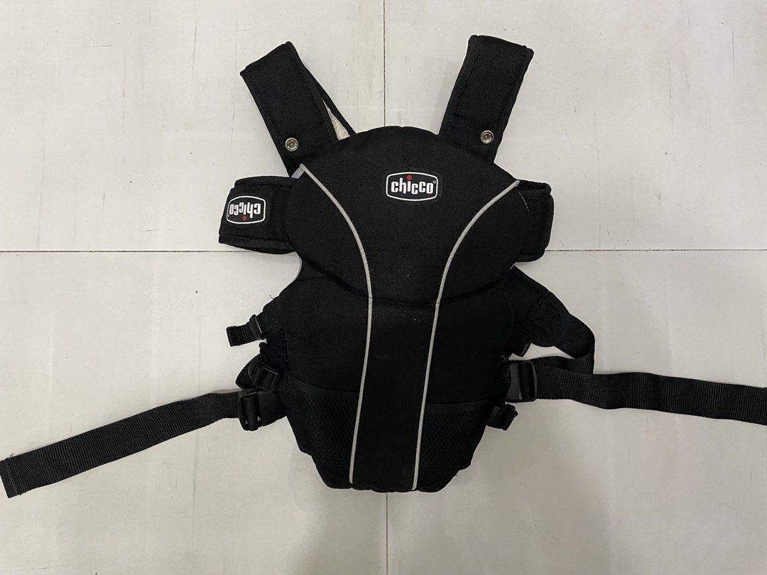 Chicco Black Baby Carrier (Category: Carriers & Slings) located in San Jose del Monte. Submitted by momma_buys (Listing ID 1465376573, Image 1). Description: - Brand: Chicco - Color: Black - Breathable front mesh sections to keep baby cool - Padded shoulder straps that cross at the back for comfort and weight distribution - Secure buckle system with multiple adjustment points for growing babies and different wearers - Clean and fully functional w