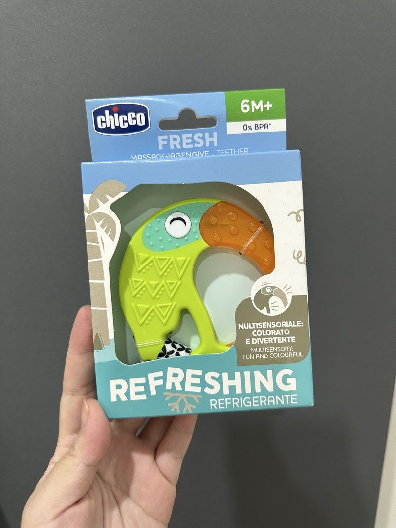 Chicco Fresh Refreshing Teether 6M+ (Category: Soothers & Pacifiers) located in Talisay. Submitted by itslucym (Listing ID 1465338422, Image 1). Description: - Brand: Chicco Fresh Refreshing Teether - Age: Suitable for babies 6 months and up - Design: Fun toucan bird shape in vibrant green and orange - Features: Multisensory toy to engage baby's senses while soothing gums - Safety: 100% BPA free - Condition: Brand new, unopened packaging with ori
