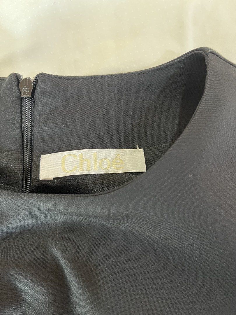Chloé Blouse (Category: Blouses) located in Muntinlupa City. Submitted by jane226ph (Listing ID 1465205447, Image 3). Description: Brand New • Never Used Elegant and timeless piece Classic Black Fits: Small to Medium Gifted / Extra Piece No occasion to use, so we’re letting it go. Original purchase details unavailable. Authenticity cannot be independently verified. Sold as-is.