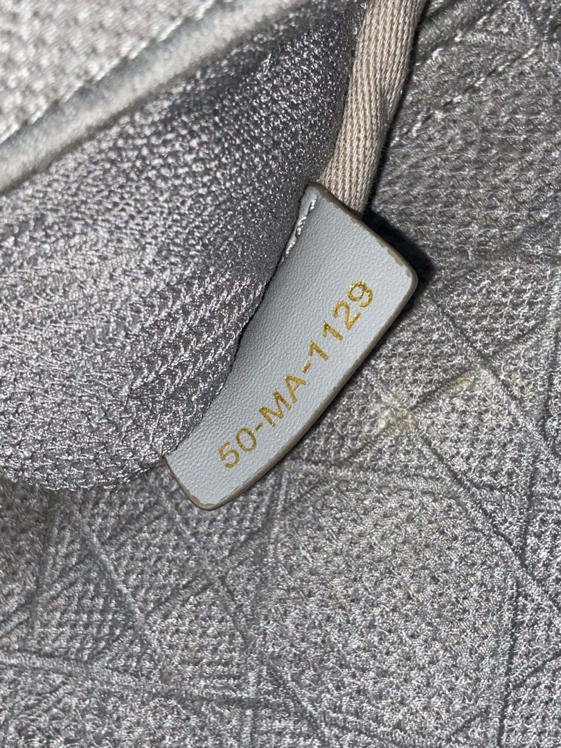 Christian Dior D lite Luxury bag (Category: Luxury Bags & Wallets) located in Caloocan City. Submitted by superkissss (Listing ID 1465246613, Image 3). Description: Selling my Dior D Lite Bag. Actual Pic posted. The background is only edited but the bag itself is the actual picture. -It has flaws like stains but manageable and it can easily removed by the professionals who clean bags because this one is Fabric or you can DIY clean it if you want.
