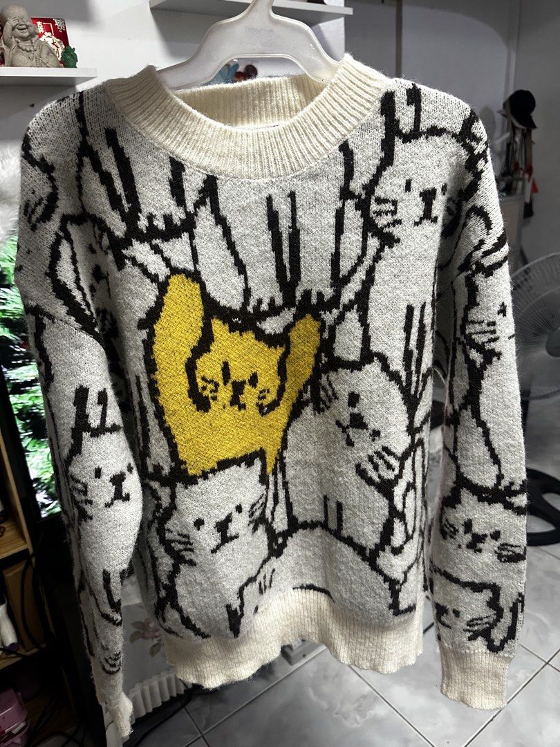 Cider Pullover Xs-M (Category: Coats, Jackets and Outerwear) located in Quezon City. Submitted by mihoho13 (Listing ID 1465343787, Image 3). Description: - Brand: Cider - Size: Extra Small (XS) - Color: White - Design: Knitted-in pattern with cute cat graphics near the bottom hem - Details: Ribbed collar and cuffs - Material: Soft and cozy texture - Condition: Great winter piece, perfect for layering.
