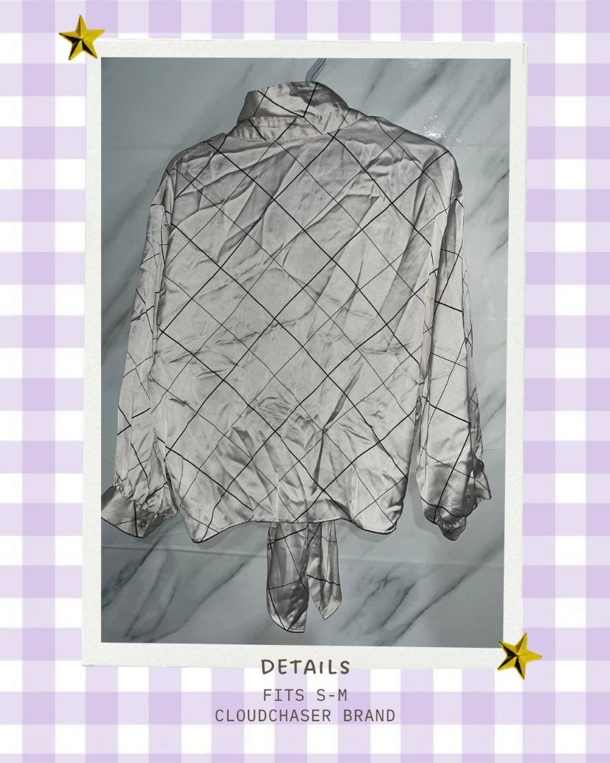 Cloudchaser Black and White Diamond Pattern Blouse with Tie Front PLEASE READ 3RD PHOTO (Category: Blouses) located in Quezon City. Submitted by memoriies (Listing ID 1465280563, Image 2). Description: - Pattern: Black and white diamond check - Material: Silky and smooth - Features: Long sleeves with button cuffs, high neck, and tie-front hem detail - Size: Fits S to M comfortably - Versatility: Ideal for both workwear and casual outings, easy to