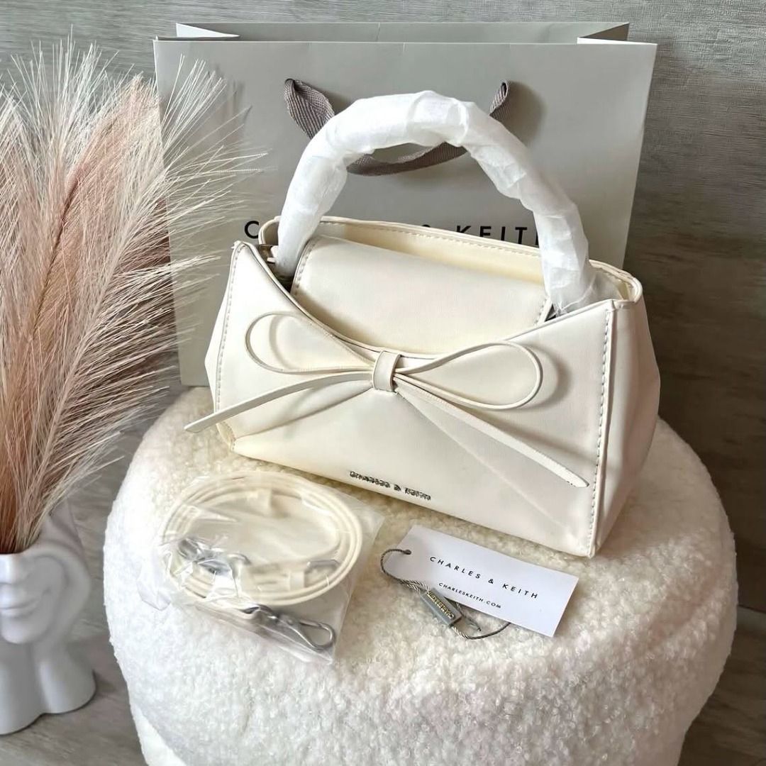 CnK Hazel Bow Panelled Top Handle Bag (Category: Cross-body Bags) located in Quezon City. Submitted by mjmassortedfinds (Listing ID 1465275432, Image 3). Description: CnK Hazel Bow Panelled Top Handle Bag ✅ 1,250 each +sf ✅ Size: (H)12.5cm x (W)20cm x (D)7cm ✅ Paperbag Add 99 ✅ M P 0 & Brandnew 📸 Actual Pictures Posted 📲 PM for orders and inquiries 📌We Ship Nationwide (+SF) 📌No Return, No Exchange 📌If in DOUBT, please DO NOT Transact 📌We ar