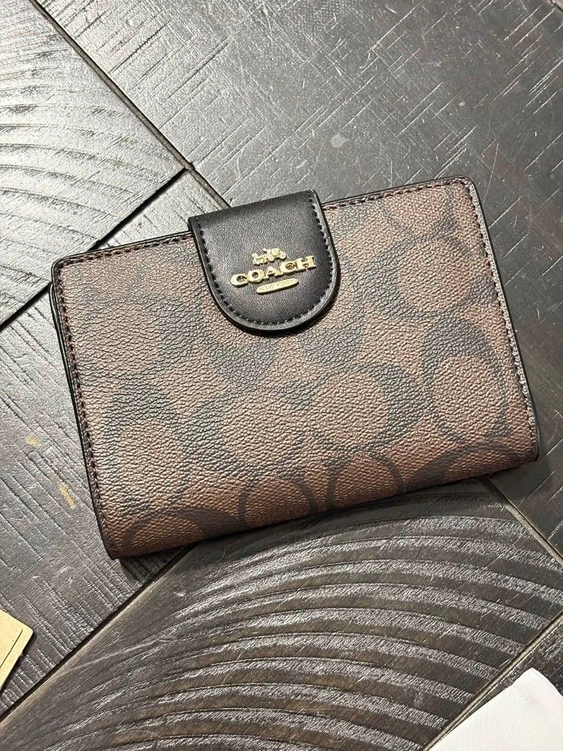 Coach Bifold Wallet (Category: Wallets & Card holders) located in Quezon City. Submitted by bagsboutiqueph (Listing ID 1465380175, Image 2). Description: LAST PRICE POSTED. LIMITED STOCKS! BRANDNEW WITH INCLUSIONS. COLOR MAY SLIGHTLY VARY IN ACTUAL DUE TO LIGHTING AND CAMERA SETTING. OTHER PHOTOS WILL BE SEND DURING PURCHASE AND FOR SURE BUYERS ONLY. WHEN IN DOUBT, DO NOT ORDER. THANK YOU..