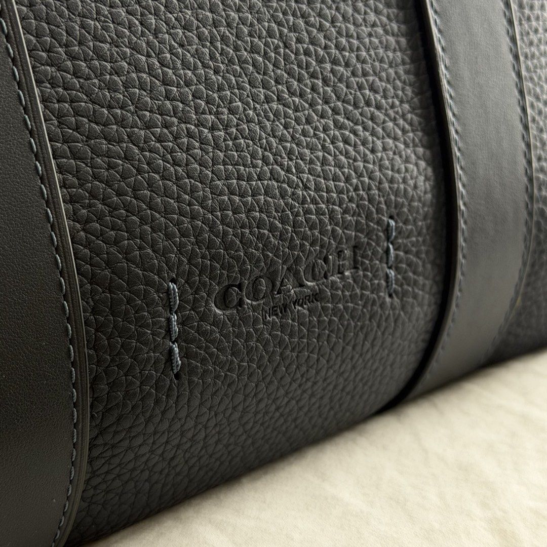 Coach Gotham Portfolio Bag (Style #C5318) (Category: Briefcases) located in Mabalacat. Submitted by philscabinet (Listing ID 1465255793, Image 3). Description: Coach Gotham Portfolio Bag (Style #C5318) - Color: Dark Blue/Navy - 100% Authentic Coach Bag - Dimensions: 15” (L) x 11.75” (H) x 4” (W) - Material: Polished pebble leather and refined calf leather - Laptop Compatibility: Fits up to a 15-inch laptop - Lightly Used (Can send more photos for