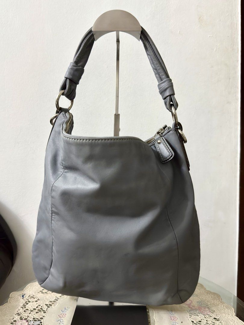 Coach Kirstin (Category: Shoulder Bags) located in Cainta. Submitted by angellyy_ (Listing ID 1465109759, Image 2). Description: Authentic Coach Kirstin Leather hobo Medium No hangtag and sling Like new Minimal flaw at the back - unnoticeable color transfer Condition - 9/10 .