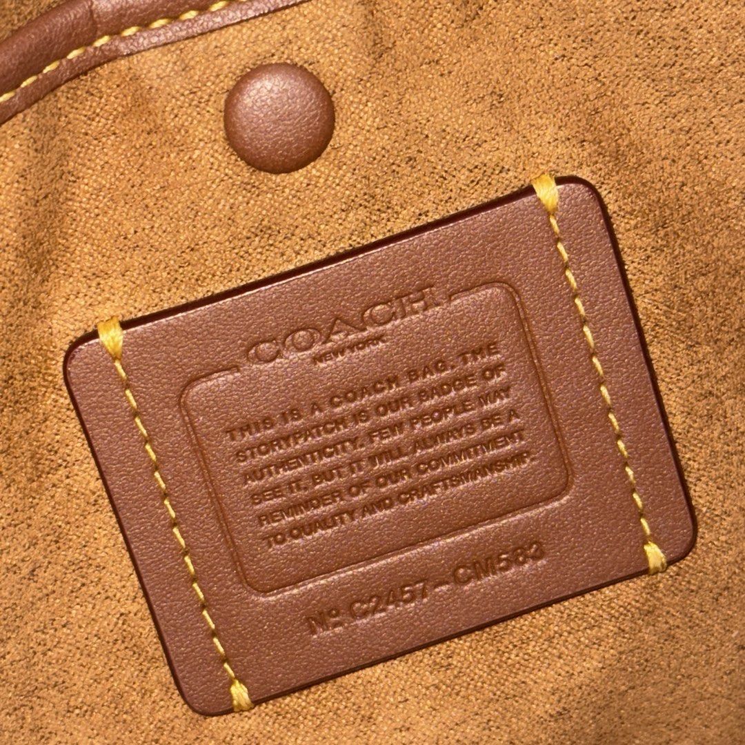 Coach Luna Shoulder Bag Chalk White Leather (Category: Luxury Bags & Wallets) located in Manila. Submitted by wisecloud_1b4b3c (Listing ID 1465266745, Image 3). Description: - Authentic Coach Luna shoulder bag in chalk white smooth leather - Elegant brass hardware and hanging Coach charm - Top zip closure with clean brown fabric lining and creed patch (Style C2457 CM583) - Includes a detachable leather strap for versatile styling - Excellent clea