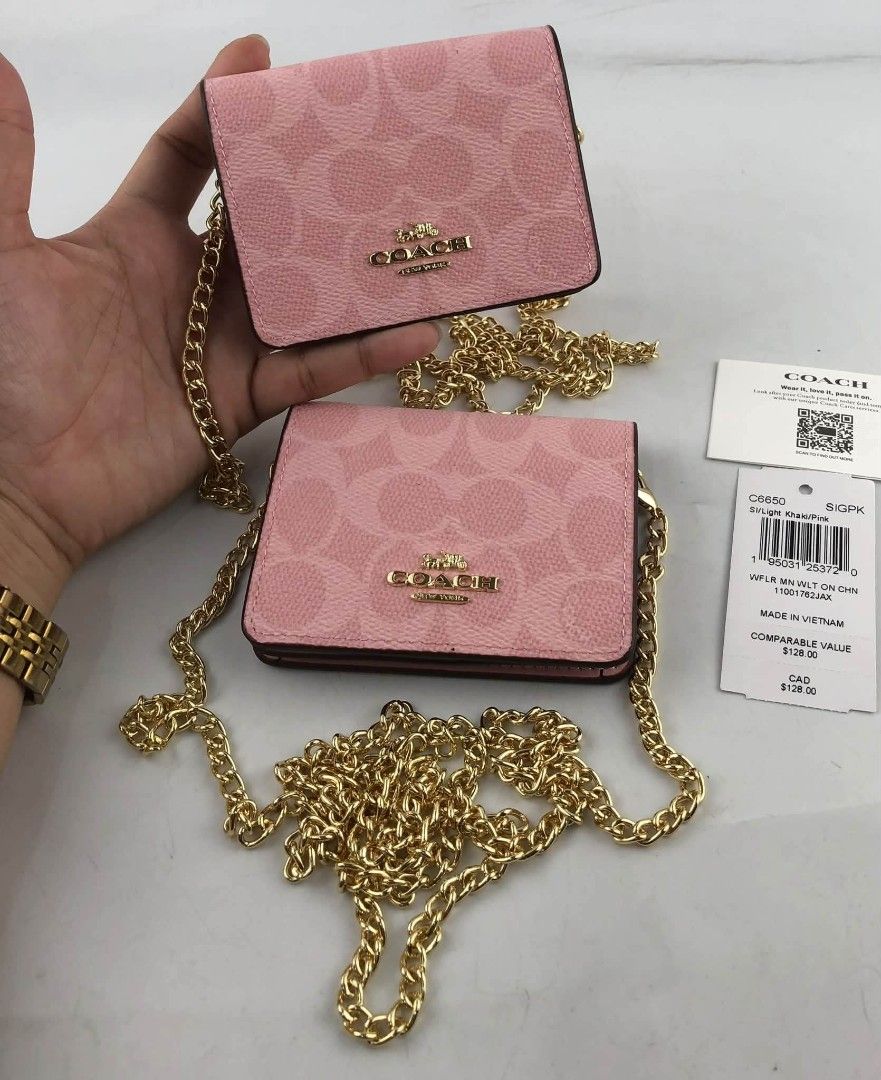 Coach Mini Chain Wallet in Signature (Category: Wallets & Card holders) located in Quezon City. Submitted by bagsboutiqueph (Listing ID 1465318685, Image 1). Description: LAST PRICE POSTED. LIMITED STOCKS! BRANDNEW WITH INCLUSIONS. COLOR MAY SLIGHTLY VARY IN ACTUAL DUE TO LIGHTING AND CAMERA SETTING. OTHER PHOTOS WILL BE SEND DURING PURCHASE AND FOR SURE BUYERS ONLY. WHEN IN DOUBT, DO NOT ORDER. THANK YOU..