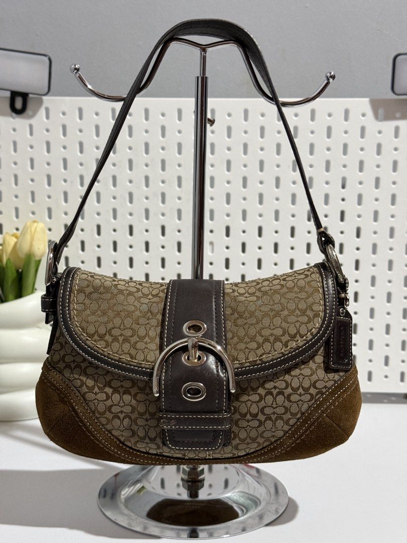 Coach Mini Soho in suede (Category: Luxury Bags & Wallets) located in Manila. Submitted by angelferre04294 (Listing ID 1465371723, Image 1). Description: Coach Mini Soho in suede Actually photo are posted napo every detail. (Manage your expectation po mga sissy since ito po at vintage bag na) It come's with generic dustbag cch.