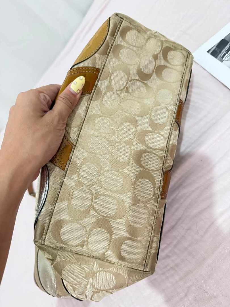Coach patchwork tote Rank AB (Category: Clutches) located in Manila. Submitted by _louisse (Listing ID 1465350601, Image 3). Description: Coach signature canvas patchwork tote with metallic leather and patent leather trim in shades of brown, gold, and tan. Dual handles with tortoiseshell flower charm accent. Spacious interior lined with fabric. Includes Coach booklet tag as pictured..