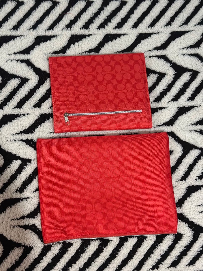 Coach Red Signature C Planner Cover with Notepad (Category: Stationery & School Supplies) located in Cebu City. Submitted by isellhere123.543 (Listing ID 1465296977, Image 2). Description: - Authentic Coach planner cover in red signature C fabric - Vibrant red interior lining with convenient card slots - Includes an official Coach-branded notepad - Features secure snap closure and sleek silver-tone hardware - Comes with a matching zip pouch for e