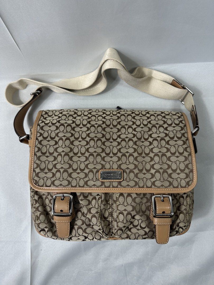 Coach Signature Canvas Messenger Bag (Category: Luxury Bags & Wallets) located in Cabanglasan. Submitted by thefashiongarage.co (Listing ID 1465228289, Image 1). Description: Title - Coach Model/Name - Signature Messenger Bag Size on Tag - Conditiion - Excellent condition with no issue Dimension (WxLxH) - 11x8 Inches Category- Casual/Formal Fitting - Made in - Material - Canvas Color - Caramel/Brown Design - Signature C Year - Inclusion - None No