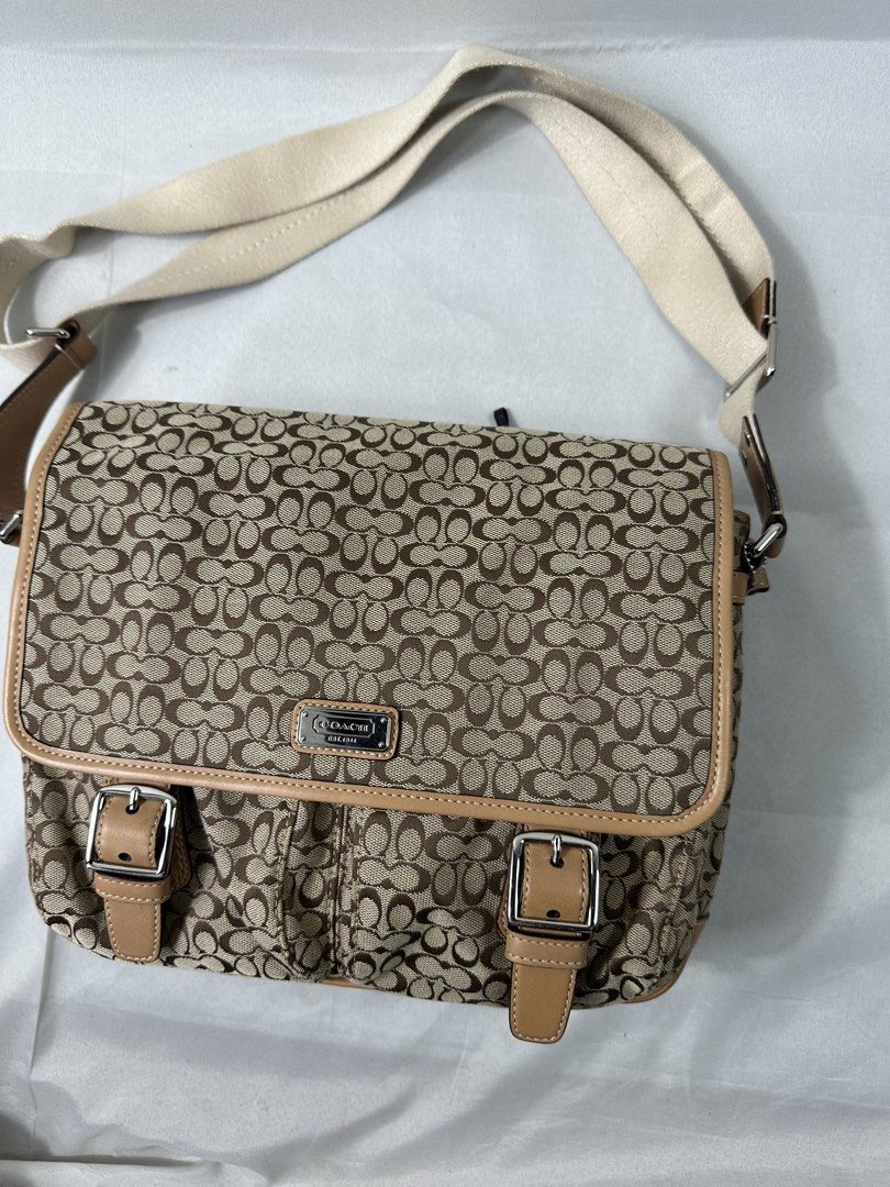 Coach Signature Canvas Messenger Bag (Category: Luxury Bags & Wallets) located in Cabanglasan. Submitted by thefashiongarage.co (Listing ID 1465228289, Image 3). Description: Title - Coach Model/Name - Signature Messenger Bag Size on Tag - Conditiion - Excellent condition with no issue Dimension (WxLxH) - 11x8 Inches Category- Casual/Formal Fitting - Made in - Material - Canvas Color - Caramel/Brown Design - Signature C Year - Inclusion - None No